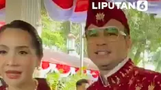 Raffi Ahmad bersama Nagita Slavina menghadiri upacara perayaan HUT ke-81 Kemerdekaan Republik Indonesia di Istana, Jakarta, Senin (17/8/2026). Dalam kesempatan tersebut, Raffi tampil mengenakan pakaian adat khas Kediri Nusantara. Kehadiran pasangan ini turut menjadi perhatian dalam rangkaian peri...