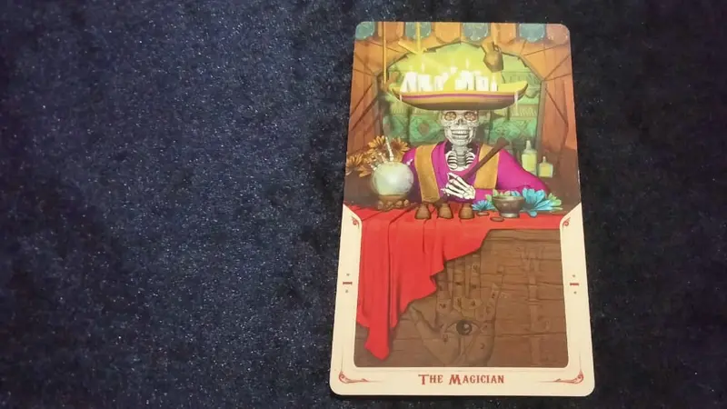 The Magician, kartu tarot yang terbuka.