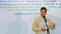 Direktur Utama BPJS Ketenagakerjaan Anggoro Eko Cahyo memberi sambutan pada penandatanganan PKS terkait Penyediaan Layanan dan Jasa Perbankan dalam Rangka Pemberian Manfaat Layanan Tambahan (MLT) Berupa Fasilitas Pembiayaan Perumahan di Jakarta, Kamis (24/03/2022). (Liputan6.com/Fery Pradolo)