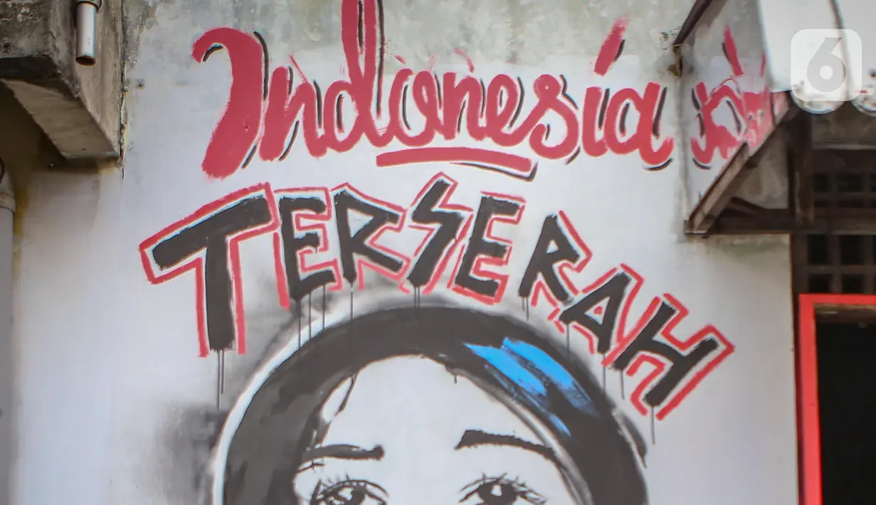 Mural bertuliskan "Indonesia terserah", di Kutabumi, Tangerang, Banten, Senin (27/5/2020). Mural dibuat sebagai bentuk kritik terhadap masyarakat yang tetap beraktivitas di luar ruangan tanpa prosedur protokol kesehatan di tengah wabah COVID-19. (Liputan6.com/Angga Yuniar)