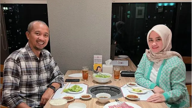 Rima Anissa dan suaminya Fitra Eri