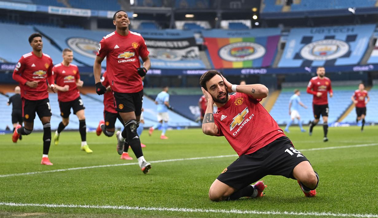 Bruno Fernandes merupakan gelandang andalan Manchester United saat ini. Diboyong dari Sporting CP dengan harga 63 juta euro pada Januari 2020 lalu, Fernandes berhasil tampil impresif dengan mencetak 43 gol dan 25 assist dari 83 pertandingan. (Foto: AFP/Pool/Laurence Griffiths)