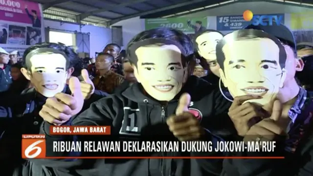 Ribuan Relawan Pos Perjuangan Rakyat untuk Jokowi (Posper) pakai topeng Jokowi di acara deklarasi dukungan.