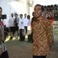 Presiden Jokowi dan Gubernur Ahok saat memberikan sembako di kawasan Cilincing, Jakarta, Kamis (3/9/2015). (Liputan6.com/Gempur M Surya)