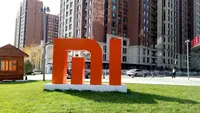 Logo Xiaomi di depan headquarter office di Beijing. Liputan6.com/Agustin Setyo Wardani