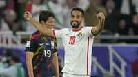 Ekspresi pemain Timnas Yordania, Mousa Al Tamari usai menjebol gawang Korea Selatan di babak semifinal Piala Asia 2023. (AP Photo/Aijaz Rahi)