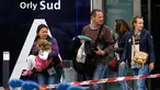 Orang-orang yang berada di Bandara Orly di Paris, Prancis, dievakuasi menyusul sebuah insiden penembakan yang terjadi pada Sabtu, (18/3). (AP Photo)