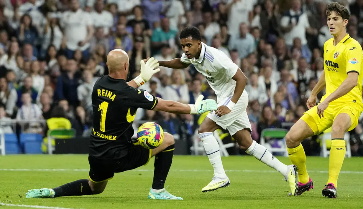 <p>Gol Real Madrid dicetak oleh gol bunuh diri Pau Torres dan Vinicius Junior. (AP Photo/Jose Breton)</p>