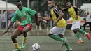 Suasana pertandingan antara Mali melawan Guinea dalam turnamen sepak bola untuk kaum migran dan orang asing bertajuk "Balon Mundial" yang dihelat 6 Juni-5 Juli 2015 di Turin, Italia. (AFP PHOTO/MARCO BERTORELLO)