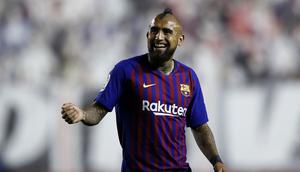 Arturo Vidal puji kemenangan Barcelona atas Rayo Vallecano (BENJAMIN CREMEL / AFP)