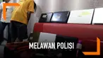 Lantaran terpojok, seorang pencuri nekat melawan polisi dengan gunakan busur panah.