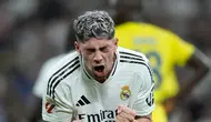 Selebrasi Federico Valverde dalam laga La Liga antara Real Madrid vs Villarreal, Minggu (6/10/2024). (c) AP Photo/Bernat Armangue