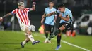 Pemain Uruguay, Luis Suarez melakoni laga terakhirnya dengan Timnas Uruguay saat laga kualifikasi Piala Dunia 2026 melawan Paraguay yang berlangsung di Stadion Centenario, Montevideo, Uruguay, Sabtu (07/09/2024) WIB. (AFP/Dante Fernandez)