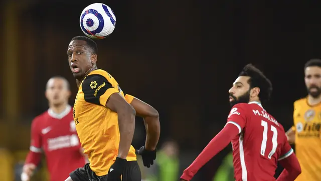 FOTO: Gol Tunggal Diogo Jota Bawa Liverpool Tundukkan Wolverhampton Wanderers - Willy Boly