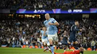 Selebrasi Erling Haaland usai mencetak gol dalam laga Manchester City vs Napoli di Liga Champions 2025/2026, Jumat (19/9/2025). (AP Photo/Dave Thompson)