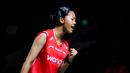 Pebulu tangkis tunggal putri Indonesia, Putri Kusuma Wardani melakukan selebrasi setelah mencetak poin atas wakil Kanda, Michelle Li dalam laga 16 besar Indonesia Open 2026 di Istora Senayan, Jakarta, Kamis (04/06/2026). (Bola.com/Bagaskara Lazuardi)
