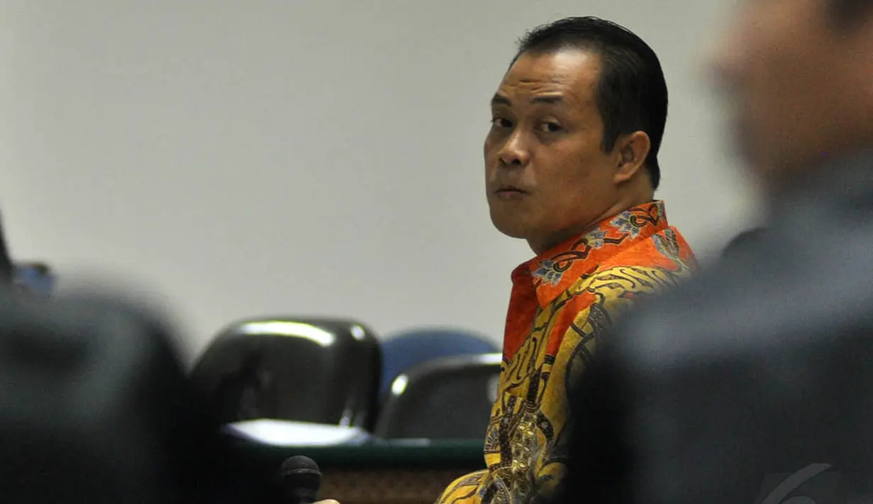 Muhtar Ependy, orang dekat mantan Ketua Mahkamah Konstitusi (MK) Akil Mochtar, terancam pidana 12 tahun penjara, Jakarta, Kamis (20/11/2014). (Liputan6.com/Miftahul Hayat)