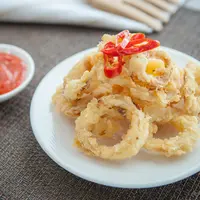 ilustrasi cumi goreng renyah gurih/copyright freepik.com/Satria Setiawan