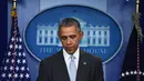 Presiden AS Barack Obama memberikan pernyataan terkait serangan bom di Perancis, Jumat (13/11/2015). Obama mengecam aksi teroris yang membunuh ratusan warga Perancis. (AFP Photo/Jim Watson)