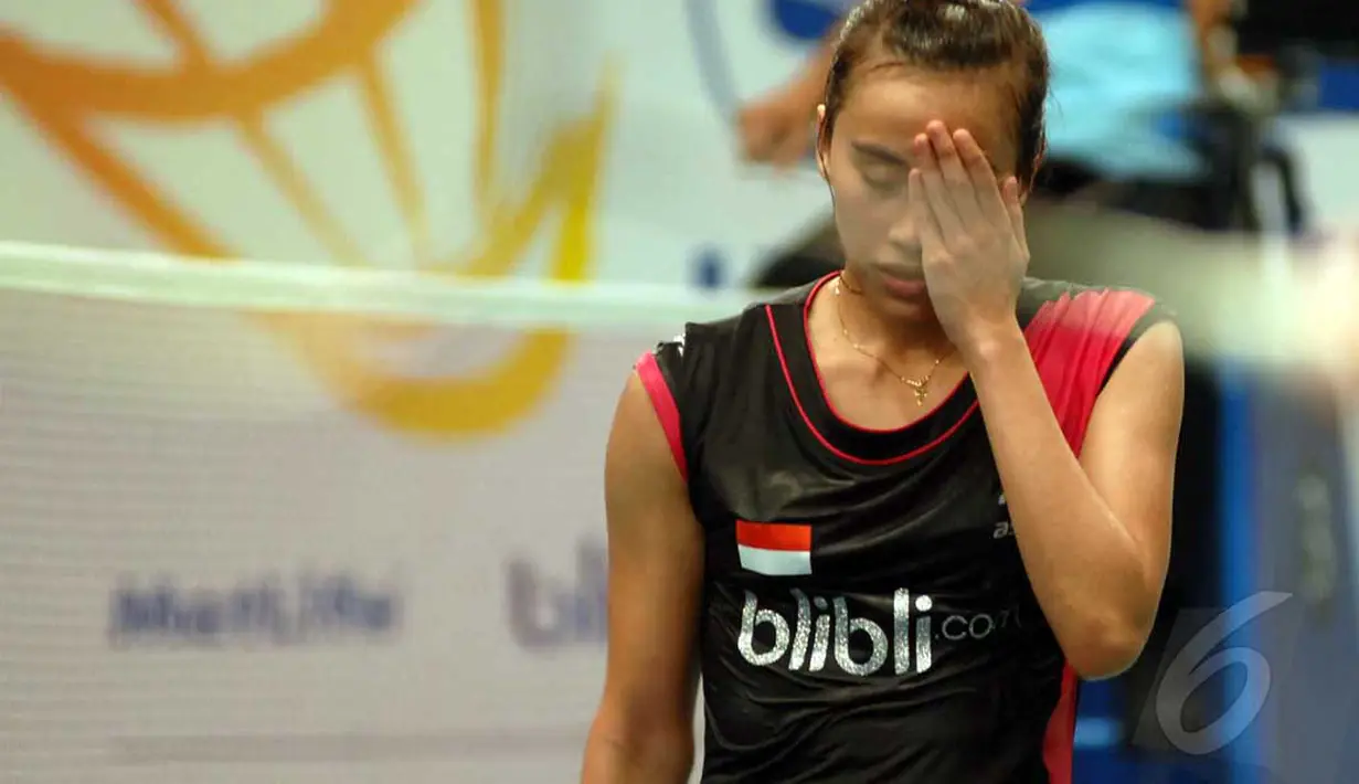 Bellaetrix Manuputty gagal mewujudkan target mencapai babak 8 besar BCA Indonesia Open Superseries Premier 2014, Jakarta, Rabu (18/6/2014) (Liputan6.com/Miftahul Hayat) 