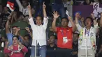Presiden Joko Widodo bersama Ibu Iriana saat menyaksikan laga Final Bulutangkis Beregu Putra Asian Games 2018 antara Indonesia melawan China di Jakarta,Rabu (22/8). (Liputan6.com/Helmi Fithriansyah)