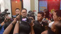 Kepala Bidang Operasi Satgas Saber Pungli Kemenkopulhukam, Brigjend Wiyanto Pusoko memberikan keterangan ke media di Polres Batu (Zainul Arifin/Liputan6.com)