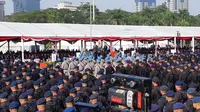 Presiden Joko Widodo (Jokowi) menghadiri upacara peringatan Hari Ulang Tahun ke-73 Bhayangkara di halaman Monas, Jakarta Pusat, Kamis (10/6/2019). (Merdeka/Intan Umbari Prihatin)