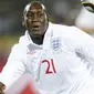 Gaya striker Inggris Emile Heskey di laga penyisihan Grup C PD 2010 melawan AS di Royal Bafokeng Stadium, Rustenburg, 12 Juni 2010. AFP PHOTO / TIMOTHY A. CLARY 