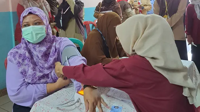 Pelaksanaan uji coba PKG di Puskesmas Beji, Depok. (Liputan6.com/Dicky Agung Prihanto)