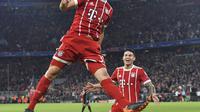 Selebrasi bek Bayern Munchen, Joshua Kimmich.(AP Photo/Kerstin Joensson)