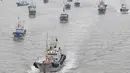 Kapal-kapal penangkap ikan berangkat dari Pelabuhan Shenjiamen di Zhoushan, Provinsi Zhejiang, China timur, pada 16 September 2020. Ini menandai berakhirnya larangan penangkapan ikan pada musim panas selama empat setengah bulan di Laut China Timur. (Xinhua/Chen Yongjian)
