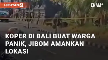 Koper misterius ditemukan di atas trotoar di Badung, Bali. Warga tidak ada yang berani membuka koper tersebut