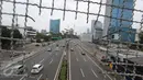 Sejumlah kendaraan melaju melintasi Jalan Gatot Subroto, Jakarta, Senin (12/12). Situasi lalu lintas di sejumlah titik Ibu Kota terpantau lancar di sejumlah jalan protokol maupun ruas tol saat libur Maulid Nabi. (Liputan6.com/Immanuel Antonius)