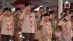 Wakil Presiden Ma’ruf Amin (kedua kanan), Ketua Kwarnas Pramuka Budi Waseso (kiri) dan Menpora Dito Ariotedjo (kedua kiri) memberi hormat saat upacara peringatan Hari Pramuka ke-62 dan pembukaan Raimuna Nasional (Rainas) XII Tahun 2023 di Bumi Perkemahan dan Graha Wisata Pramuka (Buperta), Cibubur, Jakarta, Senin (14/8/2023). (Liputan6.com/Herman Zakharia)
