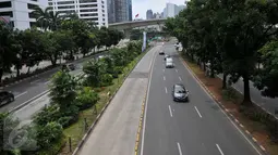 Kondisi arus lalu lintas di sepanjang Jalan Sudirman-Thamrin, Jakarta, Kamis (24/12). Suasana libur panjang yang dimulai hari ini hingga beberapa hari kedepan membuat sejumlah ruas jalan di Jakarta dan sekitarnya lengang. (Liputan6.com/Gempur M Surya)