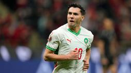 Gol tersebut berhasil membawa Maroko unggul 1-0 pada menit ke-26 dan membawa tuan rumah menang dengan skor 2-0 atas Kamerun. (AP Photo/Mosa'ab Elshamy)