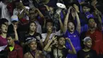 Atlet Jawa Barat, Hanna Ramadini (kiri), Gregoria Mariska, dan Tiara Rosalia Nuraidah, berbaur dengan suporter saat mendukung rekannya melawan DKI Jakarta dalam final bulutangkis PON XIX di GOR Bima, Cirebon, Jumat (23/9/2016). (Bola.com/Arief Bagus)