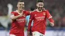 Gelandang Benfica, Rafa Silva (kanan) berselebrasi setelah mencetak gol ke gawang Club Brugge selama pertandingan babak 16 besar Liga Champions di stadion Luz di Lisbon, Portugal, Rabu (8/3/2023). Benfica menang telak atas Club Brugge 5-1 dengan agregat 7-1 sekaligus memastikan mereka lolos ke perempatfinal Liga Champions. (AP Photo/Armando Franca)