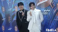 Sung Si Kyung dan Cha Eun Woo di redcarpet Golden Disc Awards 2024 di Jakarta. [Foto: Bayu Herdianto/Fimela]