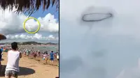 Penampakan misterius diduga UFO di sebuah pantai China. (Pear Video)