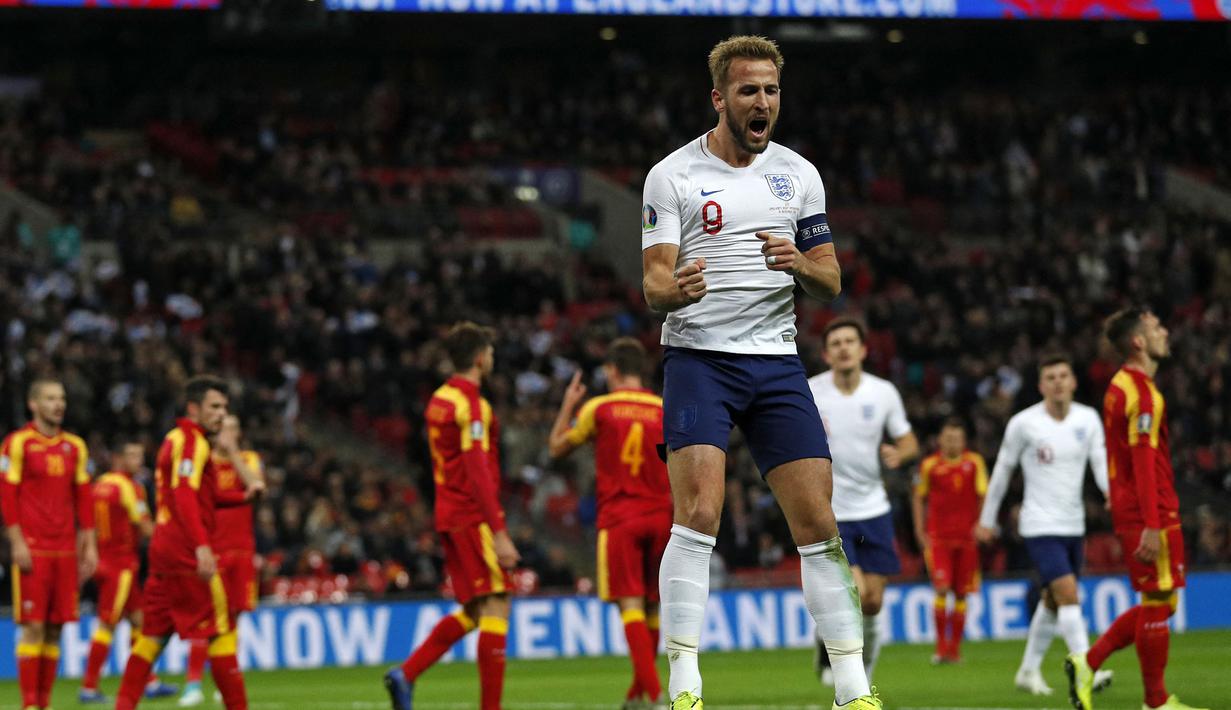 Striker Timnas Inggris berusia 30 tahun, Harry Kane total mencetak 12 gol dari 8 laga dalam kualifikasi Euro 2020. Tergabung di Grup A yang berisikan 5 negara, catatan gol Harry Kane mampu membawa negaranya lolos ke putaran final. Inggris finish sebagai juara Grup A di atas Republik Ceska dan sama-sama lolos langsung ke putaran final Euro 2020 yang diadakan di 11 negara. (AFP/Adrian Dennis)