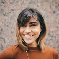 ilustrasi perempuan bahagia/copyright Unsplash/Kyle Loftus