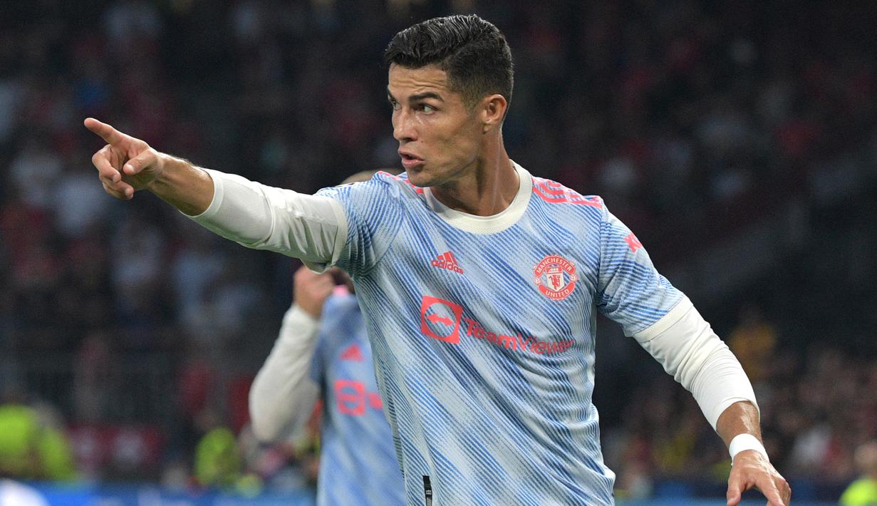Cristiano Ronaldo. Striker Portugal 37 tahun yang kini memasuki musim pertama di periode kedua bersama MU ini total mencetak 25 gol di 16 Besar Liga Champions. Dua gol teranyar dicetak saat membela Juventus menang 2-1 atas tamunya Lyon (7/8/2020) di leg kedua musim 2019/2020. (AFP/Sebastien Bozon)