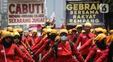 Massa yang tergabung dalam Gerakan Buruh Bersama Rakyat (GEBRAK) menggelar aksi dikawasan Patung Kuda, Jakarta, Senin (2/10/2023). (Liputan6.com/Faizal Fanani)