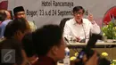 Menteri Hukum dan HAM Yasonna Laoly saat rapat koordinasi di Bogor, Jawa Barat, Jumat (23/9) malam. Yasonna mengatakan pemberian remisi terhadap koruptor harusnya dilakukan oleh hakim saat vonis di pengadilan. (Liputan6.com/Angga Yuniar)