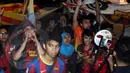 Keriangan fans klub Barcelona menyambut kedatangan Trofi Liga Champions di Jakarta.(Liputan6.com/Helmi Fitriyansyah)