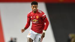 1. Marcus Rashford (Manchester United) - Penyerang berusia tahun ini dipercaya untuk menggunakan nomor 10 Manchester United pada 2018 lalu. Marcus Rashford tampil apik pada musim lalu dengan sumbangan 17 gol dan 8 assist dari 31 penampilannya. (AFP/Paul Ellis/pool)
