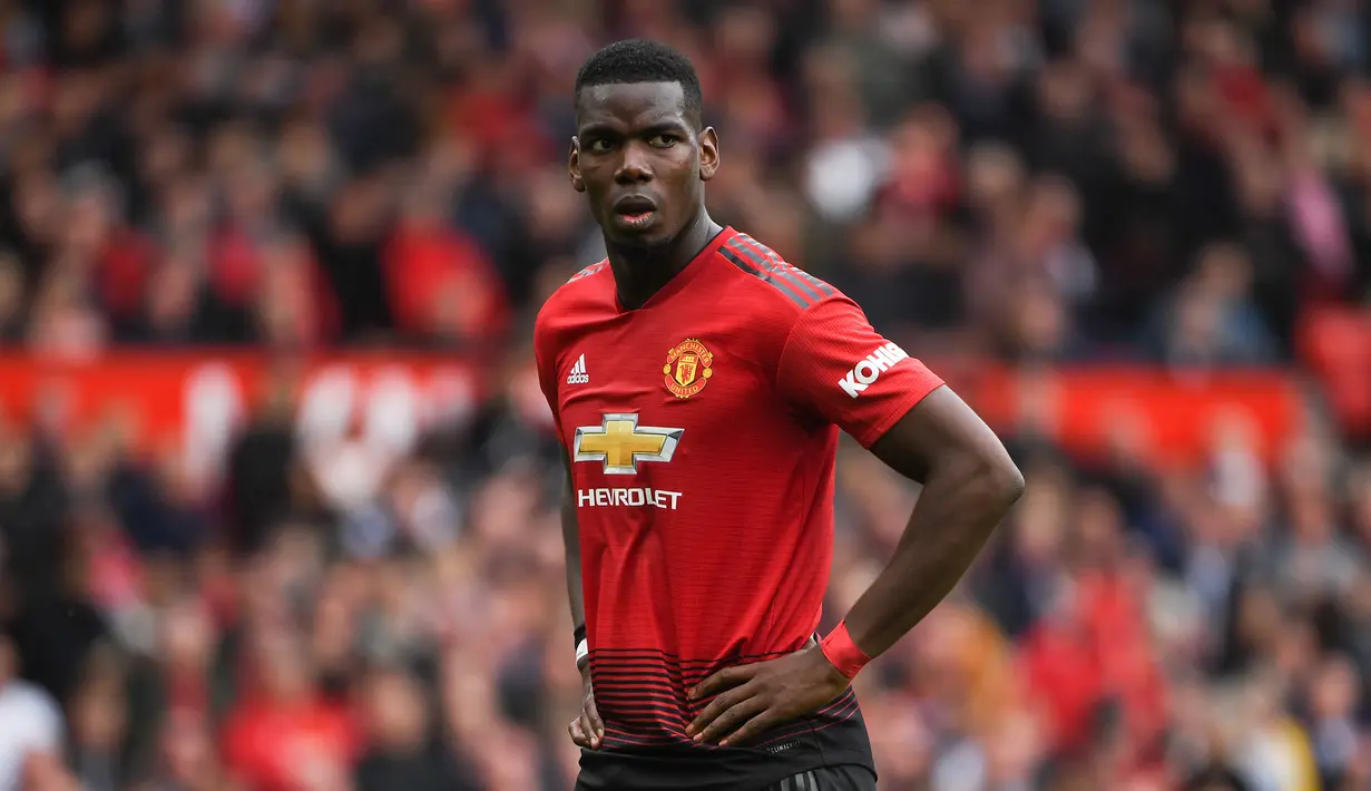 8. Paul Pogba (28,5 juta dolar) - Pogba memperoleh 28,5 juta dolar dari 23 juta dolar dari gaji dan bonus serta 5,5 juta dolar dari pendapatan iklan. (AFP/Paul Ellis)
