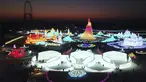 Foto udara menunjukkan wisatawan mengunjungi Dunia Es-Salju Harbin di Harbin di Provinsi Heilongjiang, China timur laut, Sabtu (25/12/2021). Dunia Es-Salju Harbin ke-23 dibuka untuk umum pada hari Sabtu. (Wang Jianwei/Xinhua via AP)