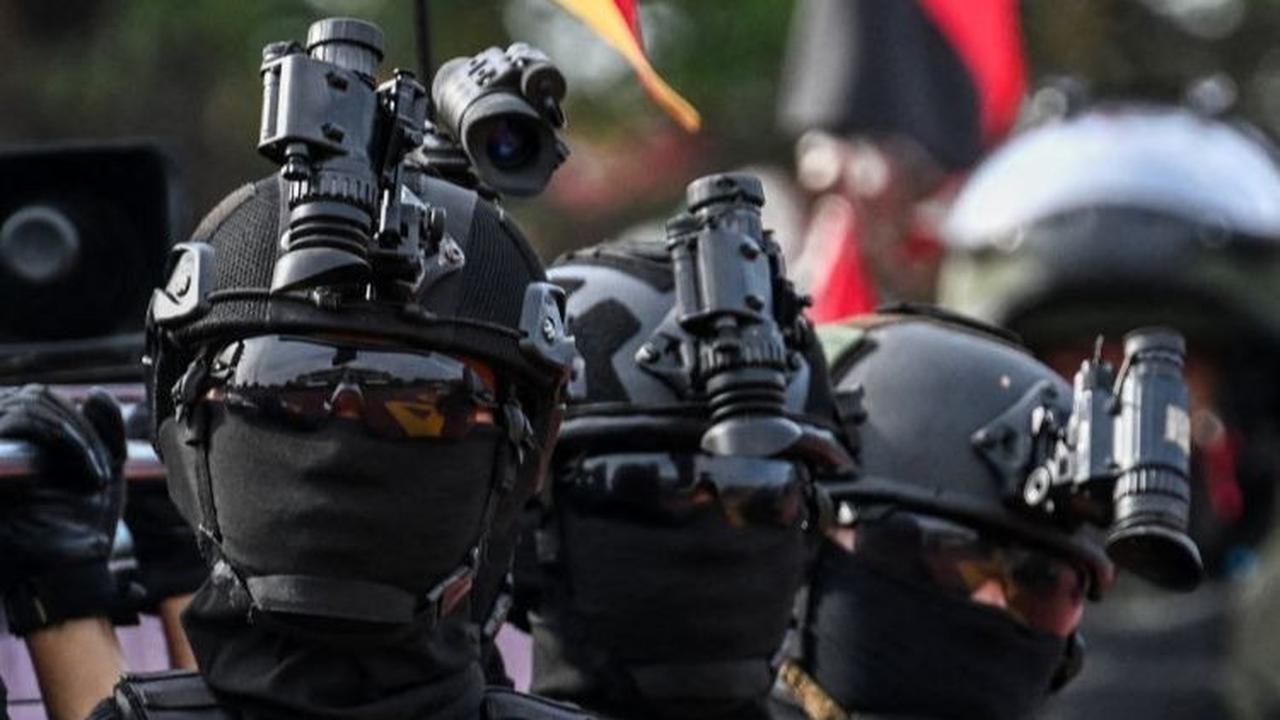 Tema ini mencerminkan komitmen Polri dalam mendukung pembangunan ekonomi berkelanjutan di Indonesia. Foto: CHAIDEER MAHYUDDIN / AFP<br>